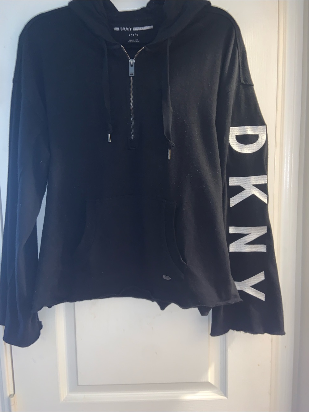 DKNY Black Half‑Zip Hoodie with Bold Sleeve Logo